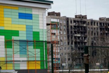 Invaders accommodate Russian arrivals in new apartment blocks erected to replace mutilated Ukrainian houses