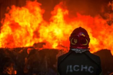 Missile debris causes fire in warehouse facilities in Kyiv