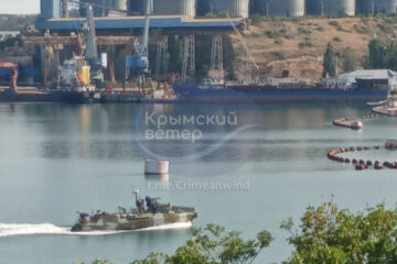 Partisans in Crimea scout boom barrier system in Sevastopol Bay