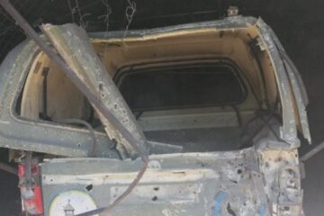 Humanitarian aid vehicle damaged by shelling in Beryslav