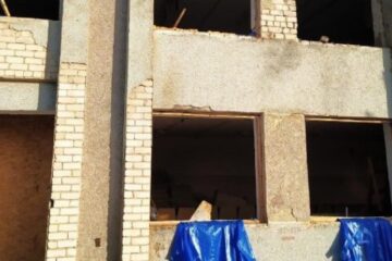 Russian drones attack Kherson region village in morning, damage administrative building