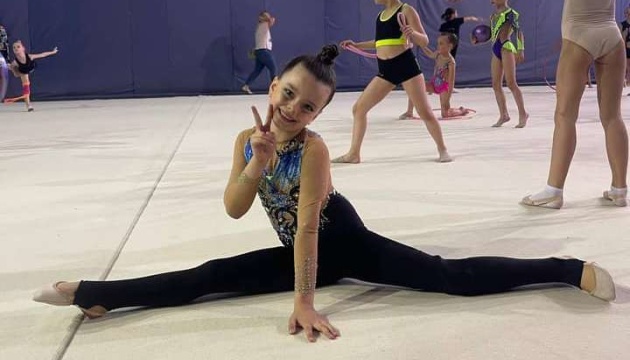 Ukrainian girl who lost leg in Russian strike goes back to competing in gymnastics